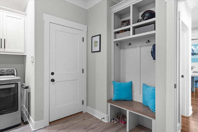 12951 Blakeslee Dr, Soddy Daisy, TN 37379 - mudroom with washer / dryer, light wood finished floors, and radiator heating unit