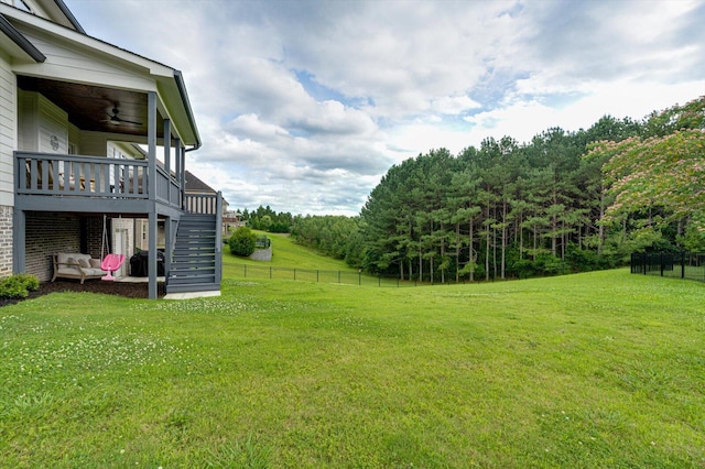 12951 Blakeslee Dr, Soddy Daisy, TN 37379 - view of yard featuring stairs, a wooden deck, and a ceiling fan
