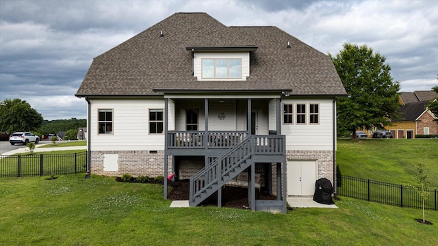 12951 Blakeslee Dr, Soddy Daisy, TN 37379 - rear view of house with a fenced backyard, stairway, a shingled roof, and brick siding