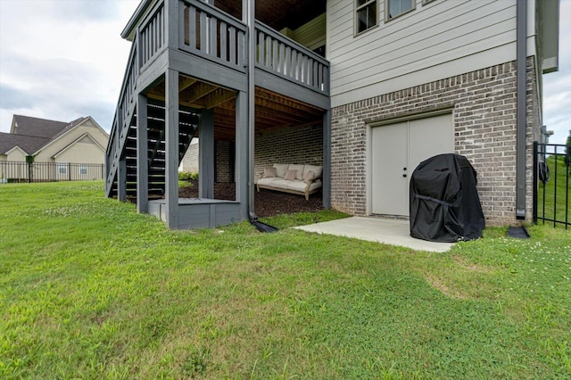 12951 Blakeslee Dr, Soddy Daisy, TN 37379 - back of house with brick siding, stairs, a deck, and an outdoor living space