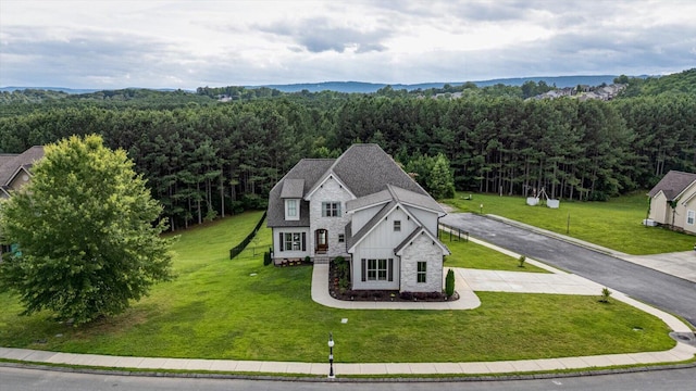 12951 Blakeslee Dr, Soddy Daisy, TN 37379 - aerial view of property and surrounding area with a forest
