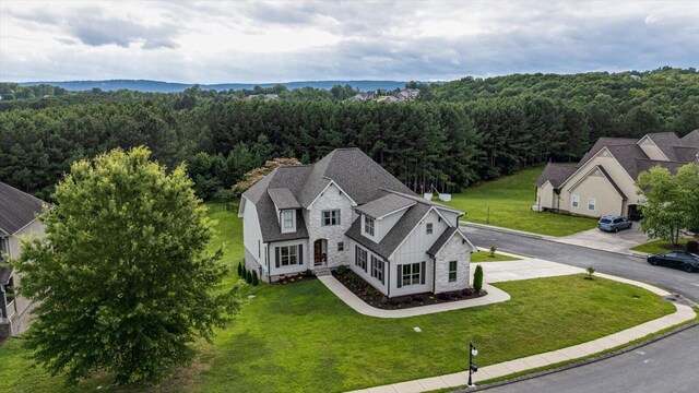 12951 Blakeslee Dr, Soddy Daisy, TN 37379 - aerial view of property and surrounding area with a heavily wooded area