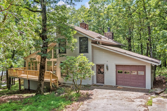 507 Big Stump Mountain Trl, Jasper, GA 30143 - view of front of property with a chimney, a wooden deck, and concrete driveway