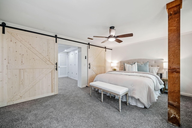 507 Big Stump Mountain Trl, Jasper, GA 30143 - bedroom featuring a barn door, carpet floors, ornamental molding, and ceiling fan
