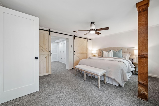 507 Big Stump Mountain Trl, Jasper, GA 30143 - bedroom featuring carpet, a barn door, ornamental molding, and ceiling fan