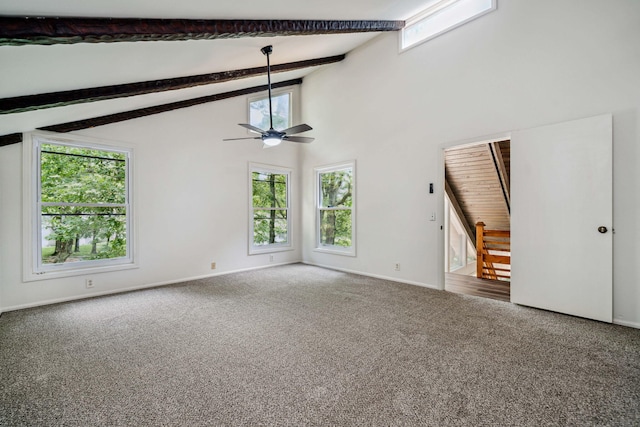 507 Big Stump Mountain Trl, Jasper, GA 30143 - carpeted empty room featuring a ceiling fan, beam ceiling, and high vaulted ceiling