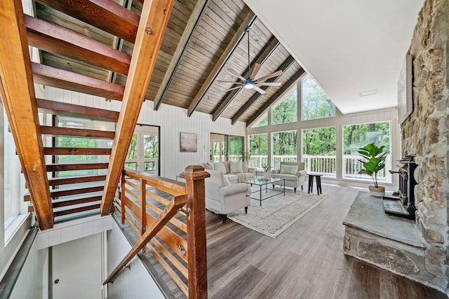507 Big Stump Mountain Trl, Jasper, GA 30143 - living room with plenty of natural light, wood finished floors, ceiling fan, a wood ceiling with exposed beams, and high vaulted ceiling