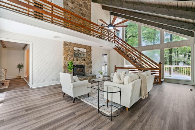 507 Big Stump Mountain Trl, Jasper, GA 30143 - living area with high vaulted ceiling, wood finished floors, stairs, ceiling fan, and beamed ceiling