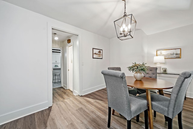 507 Big Stump Mountain Trl, Jasper, GA 30143 - dining area featuring wood finished floors and a chandelier