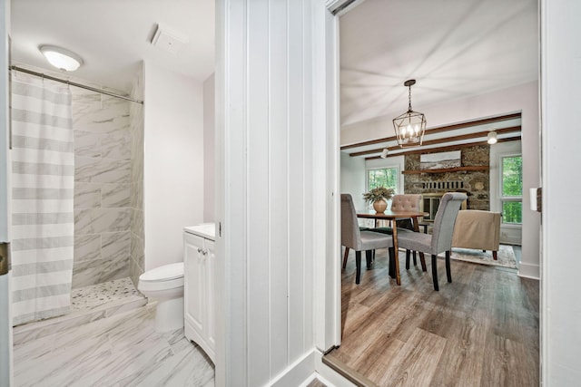 507 Big Stump Mountain Trl, Jasper, GA 30143 - full bathroom featuring a tile shower, healthy amount of natural light, vanity, and a chandelier