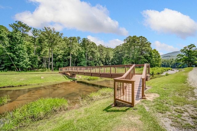 507 Big Stump Mountain Trl, Jasper, GA 30143 - gate featuring a lawn, a deck with water view, a forest view, and stairway