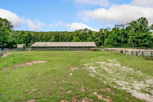 507 Big Stump Mountain Trl, Jasper, GA 30143 - view of yard featuring a forest view, an enclosed riding area, an outbuilding, and a view of rural / pastoral area
