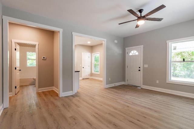 409 Hall St, Lafayette, GA 30728 - entrance foyer with light wood finished floors, healthy amount of natural light, and a ceiling fan