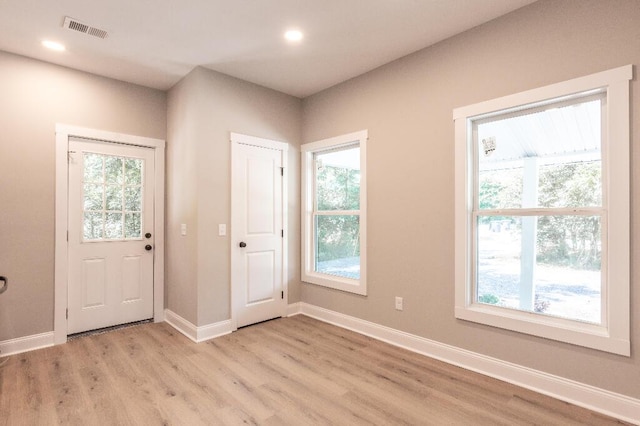 409 Hall St, Lafayette, GA 30728 - entryway with light wood-style flooring, healthy amount of natural light, and recessed lighting