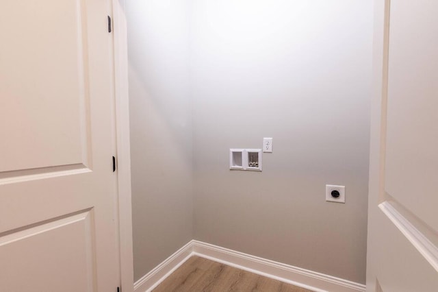 409 Hall St, Lafayette, GA 30728 - laundry area featuring electric dryer hookup, hookup for a washing machine, and light wood-type flooring
