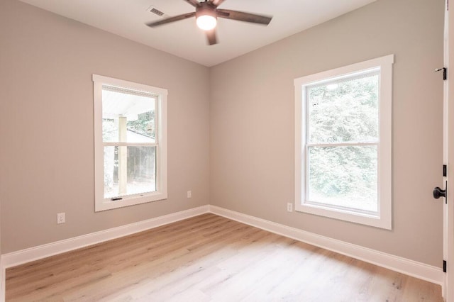 409 Hall St, Lafayette, GA 30728 - spare room with light wood finished floors, a ceiling fan, and plenty of natural light