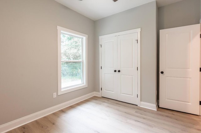 409 Hall St, Lafayette, GA 30728 - unfurnished bedroom with light wood-type flooring and a closet