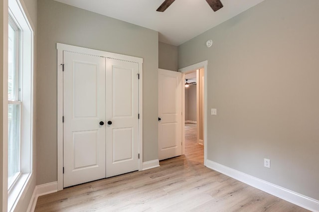 409 Hall St, Lafayette, GA 30728 - unfurnished bedroom with light wood-type flooring, a closet, and ceiling fan