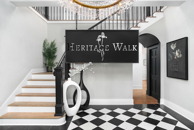 147 Honeycomb Ln, Chattanooga, TN 37421 - staircase featuring a high ceiling and arched walkways