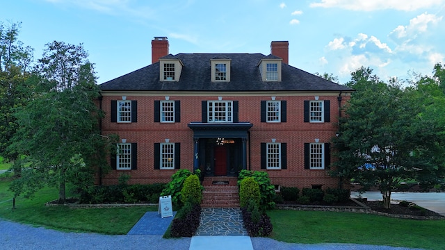 147 Honeycomb Ln, Chattanooga, TN 37421 - colonial-style house with a chimney, a front yard, and brick siding