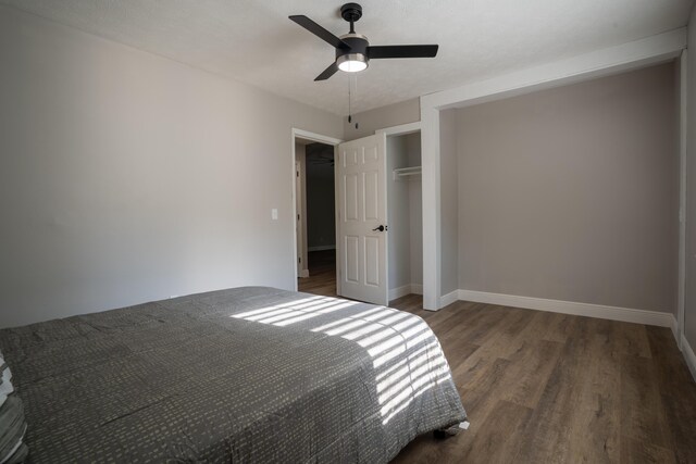 316 Old Hales Gap Rd, Trenton, GA 30752 - unfurnished bedroom with wood finished floors, a closet, and a ceiling fan