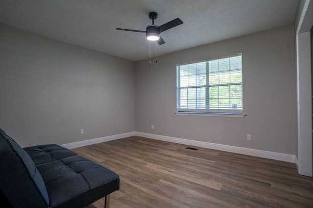 316 Old Hales Gap Rd, Trenton, GA 30752 - unfurnished room featuring a ceiling fan, dark wood-type flooring, and a textured ceiling