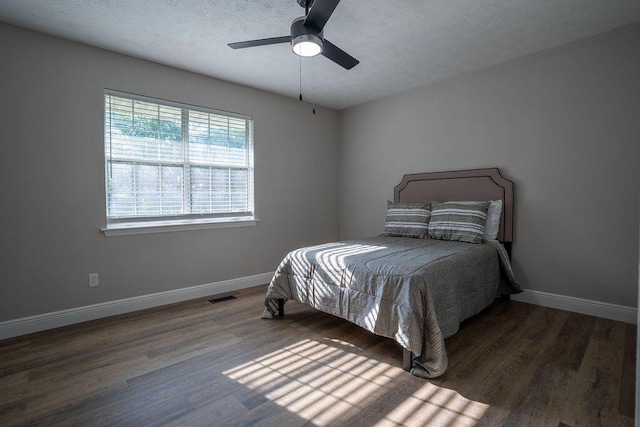 316 Old Hales Gap Rd, Trenton, GA 30752 - bedroom featuring wood finished floors, a textured ceiling, and ceiling fan