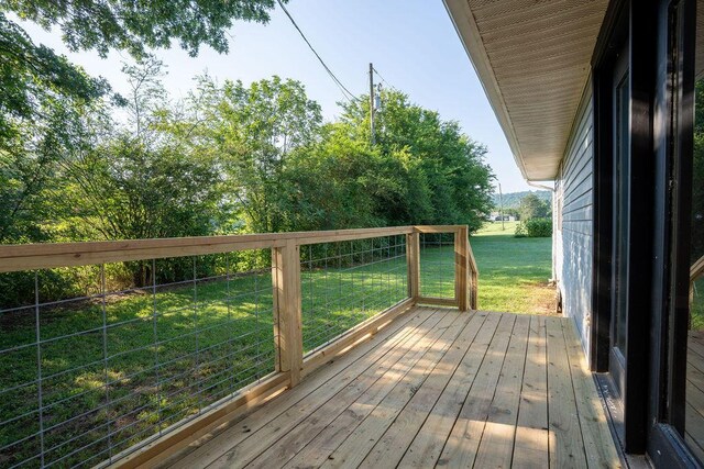 316 Old Hales Gap Rd, Trenton, GA 30752 - wooden terrace featuring a yard
