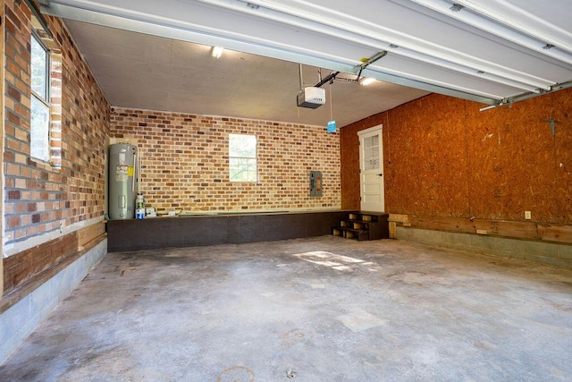 316 Old Hales Gap Rd, Trenton, GA 30752 - garage featuring a garage door opener and electric water heater