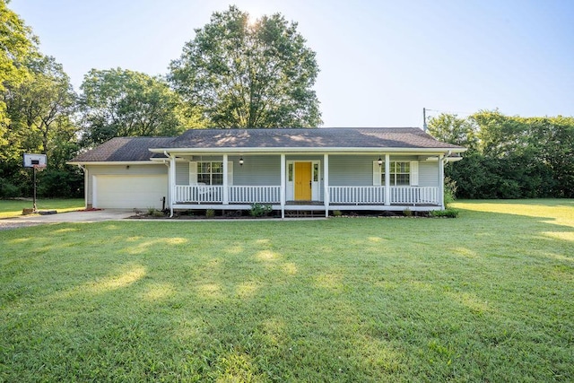 316 Old Hales Gap Rd, Trenton, GA 30752 - view of front of home with covered porch, an attached garage, a front yard, and asphalt driveway
