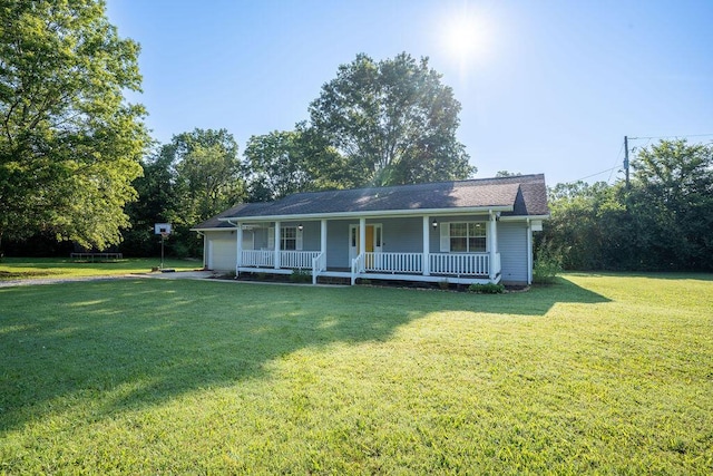 316 Old Hales Gap Rd, Trenton, GA 30752 - view of front of house with covered porch, an attached garage, and a front yard