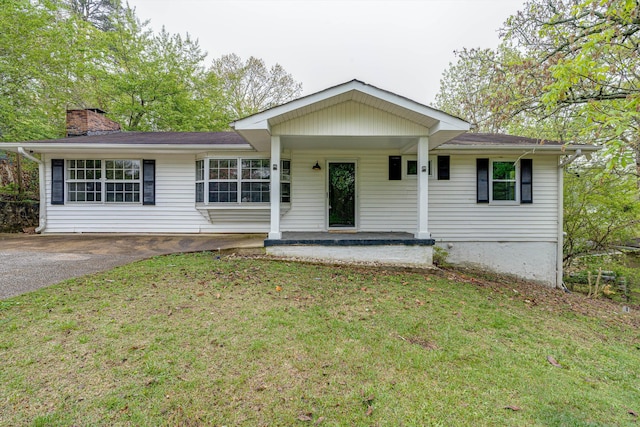 3706 Altamira Dr, Chattanooga, TN 37412 - ranch-style home featuring a front yard, a chimney, asphalt driveway, and covered porch