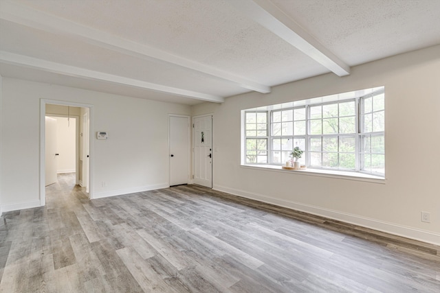 3706 Altamira Dr, Chattanooga, TN 37412 - entrance foyer with beam ceiling, a textured ceiling, and wood finished floors