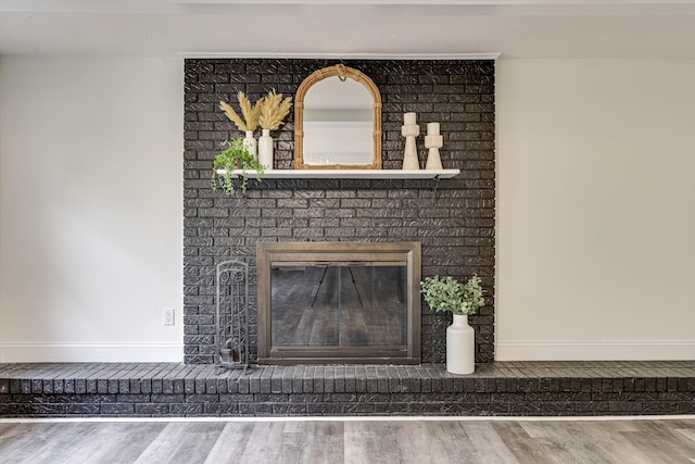 3706 Altamira Dr, Chattanooga, TN 37412 - detailed view of wood finished floors and a brick fireplace