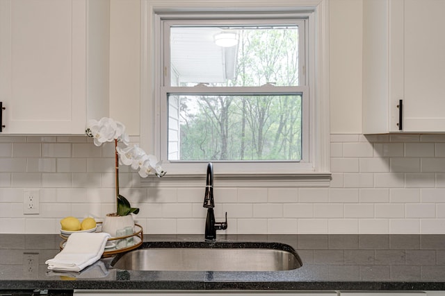 3706 Altamira Dr, Chattanooga, TN 37412 - kitchen with white cabinets, plenty of natural light, and decorative backsplash