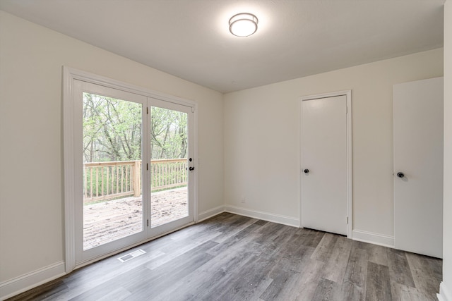 3706 Altamira Dr, Chattanooga, TN 37412 - unfurnished bedroom with wood finished floors and access to outside