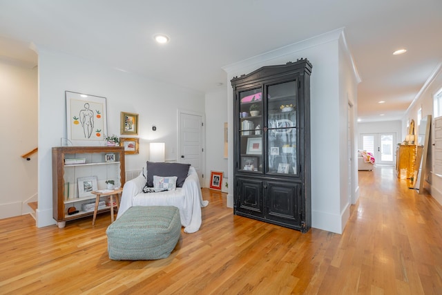 661 E 16th St, Chattanooga, TN 37408 - living area with light wood-style flooring, recessed lighting, crown molding, and stairway