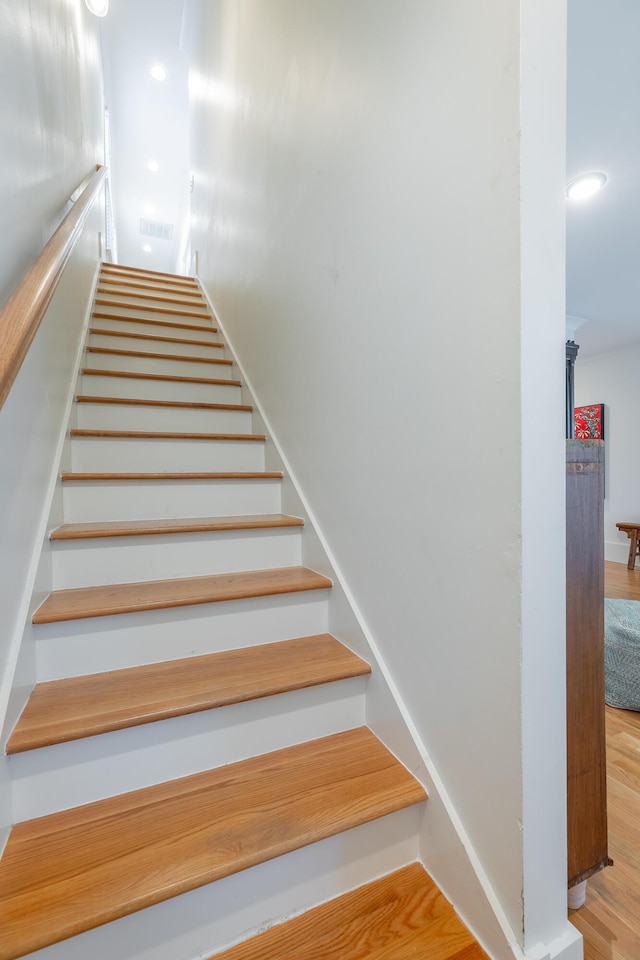 661 E 16th St, Chattanooga, TN 37408 - staircase with wood finished floors and recessed lighting