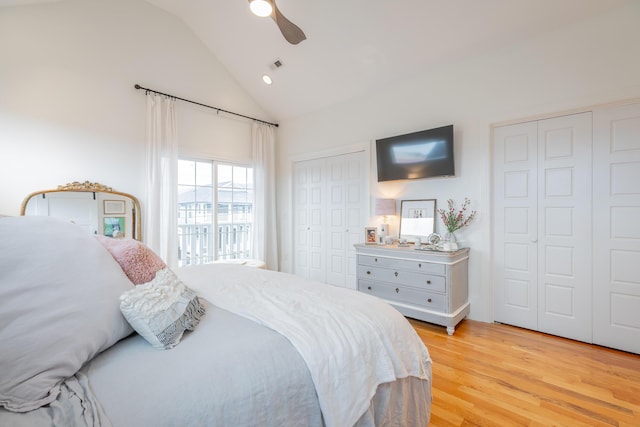 661 E 16th St, Chattanooga, TN 37408 - bedroom with two closets, light wood-style floors, high vaulted ceiling, and ceiling fan
