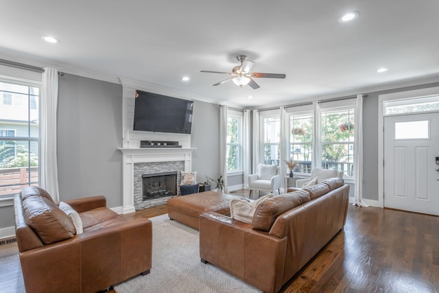 1023 Givens Rd, Chattanooga, TN 37421 - living room featuring ceiling fan, recessed lighting, a stone fireplace, crown molding, and plenty of natural light