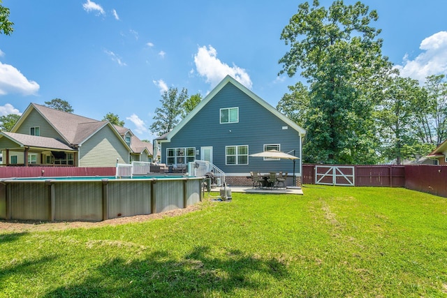 1023 Givens Rd, Chattanooga, TN 37421 - back of house featuring a fenced backyard and a patio