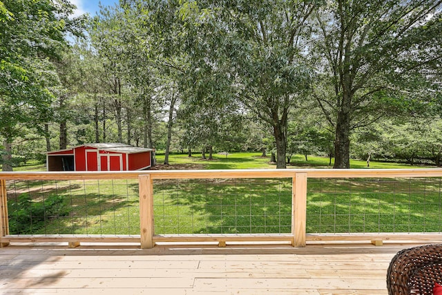 176 Ola Dr, Cohutta, GA 30710 - deck with a storage shed, a yard, and view of scattered trees