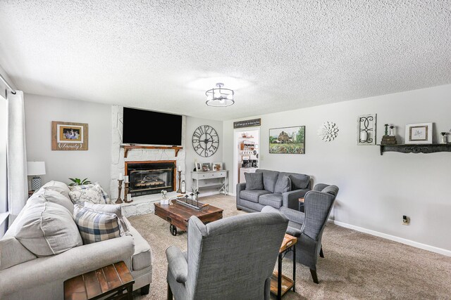 176 Ola Dr, Cohutta, GA 30710 - living room featuring carpet floors, a fireplace, and a textured ceiling
