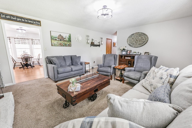 176 Ola Dr, Cohutta, GA 30710 - living area featuring a chandelier and carpet