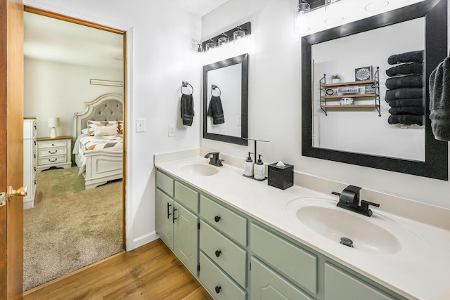 176 Ola Dr, Cohutta, GA 30710 - bathroom with ensuite bath, double vanity, and wood finished floors