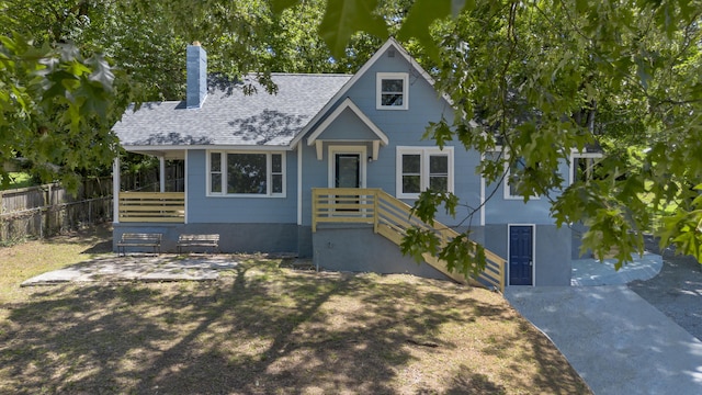 3018 14th Ave, Chattanooga, TN 37407 - view of front of house featuring a chimney and a shingled roof