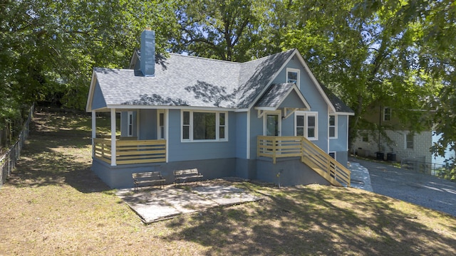 3018 14th Ave, Chattanooga, TN 37407 - view of front of property featuring a chimney and roof with shingles