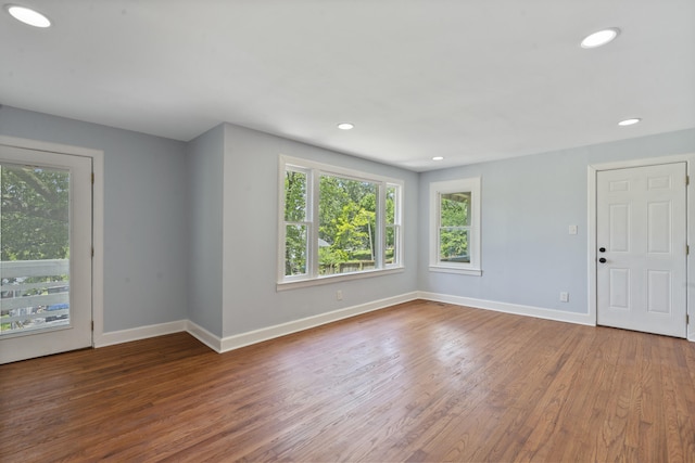 3018 14th Ave, Chattanooga, TN 37407 - unfurnished room featuring plenty of natural light, wood finished floors, and recessed lighting