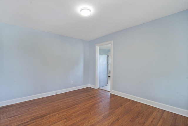 3018 14th Ave, Chattanooga, TN 37407 - spare room featuring dark wood-style floors and baseboards