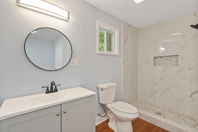 3018 14th Ave, Chattanooga, TN 37407 - bathroom featuring vanity, wood finished floors, and a marble finish shower